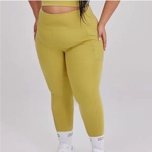 Girlfriend Collective high rise pocket leggings pear
